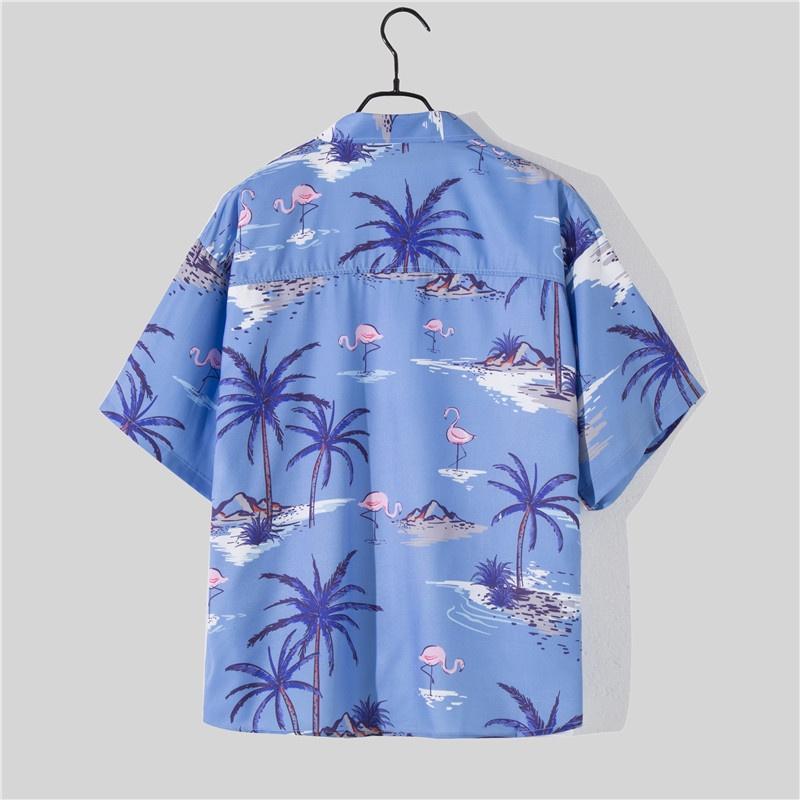 Bộ đồ đi biển gồm áo tay ngắn in hoa và quần dáng rộng phong cách Hawaii dành cho nam