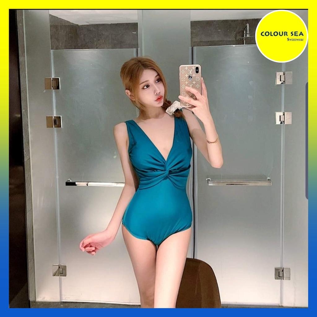 Bikini xanh biển xoắn ngực che bụng cực tốt