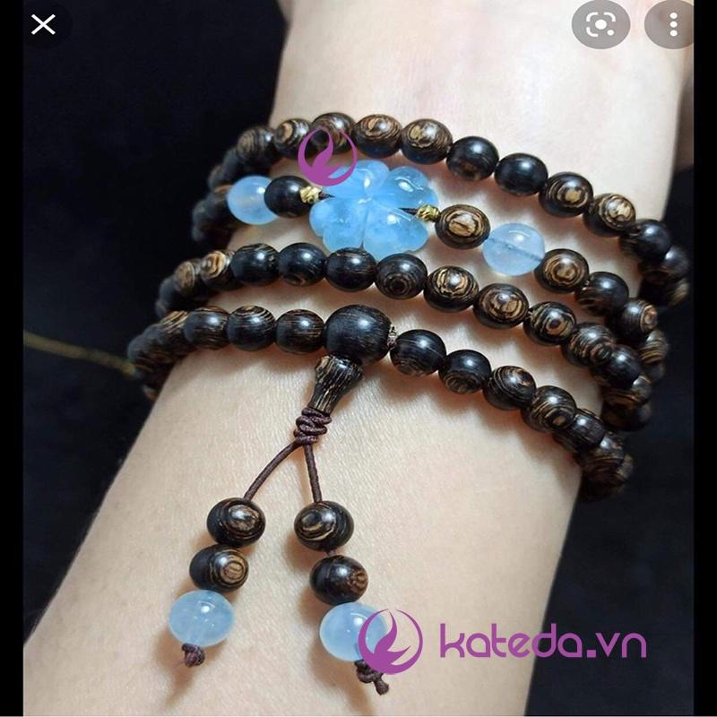 Cỏ bốn lá mix vòng tay dây thép , vòng gỗ .