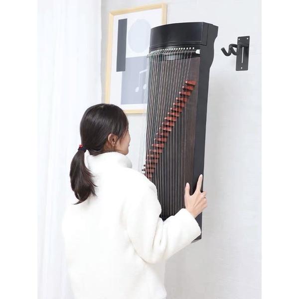 Móc treo đàn guzheng và cổ cầm trên tường