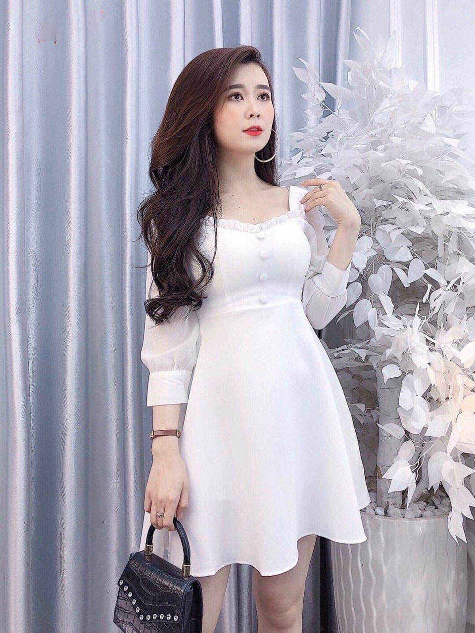 Đầm lụa xòe tay bo