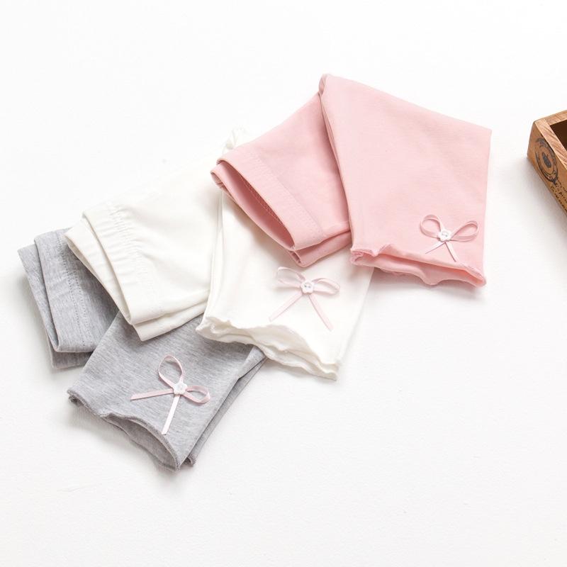 Quần legging dài cho bé gái Easy Baby họa tiết nơ, chất cotton thoáng mát cho bé từ 12-24kg