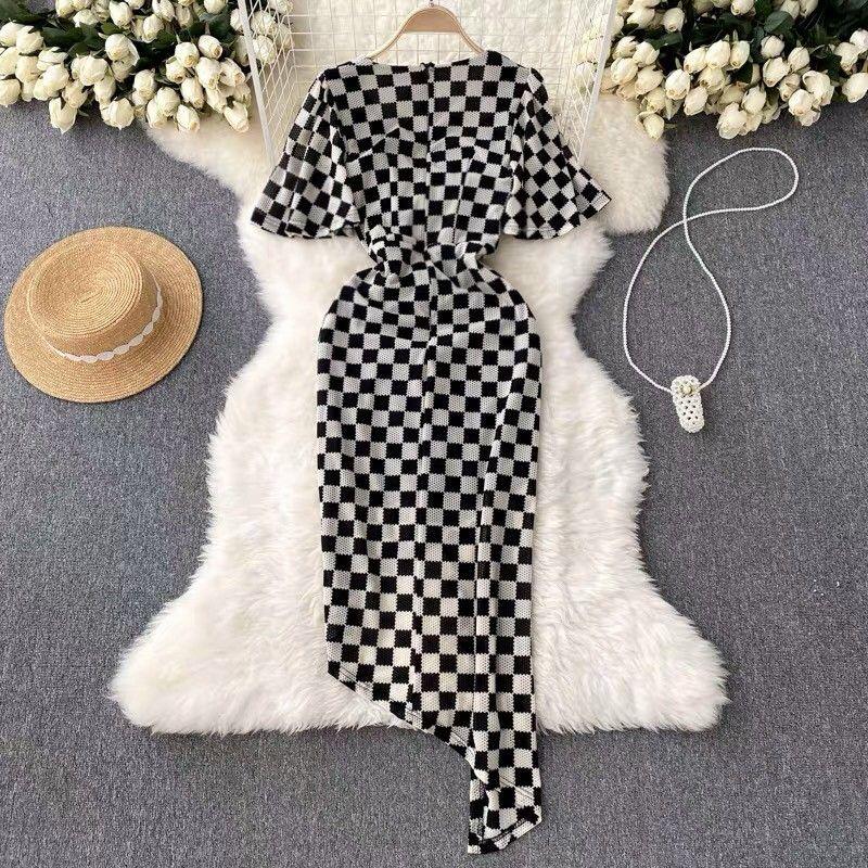 ĐẦM BODY CARO NHÚN EO