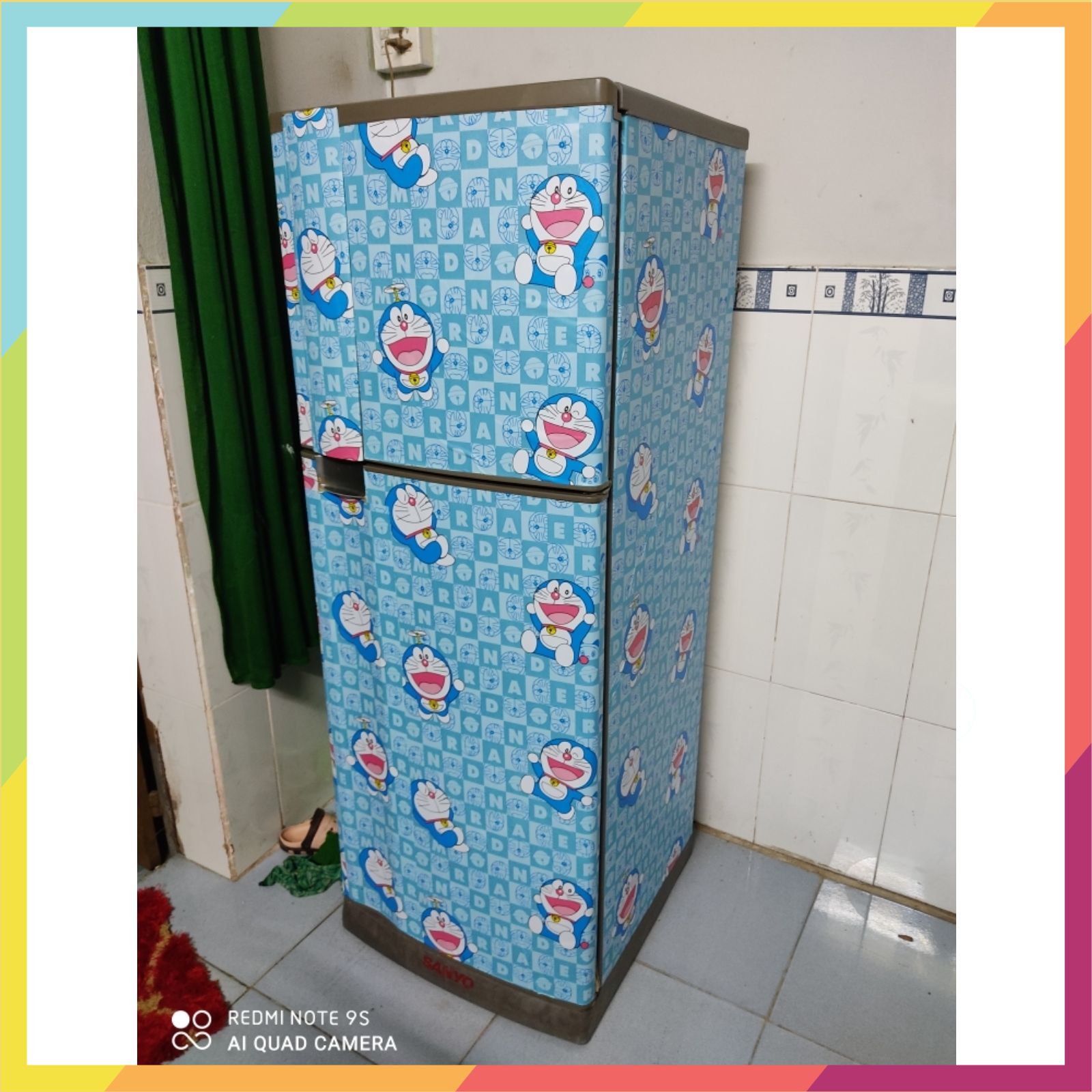 Giấy dán tường có sẵn keo, in hình doremon xanh, kích thước 0.45m x 10m / cuộn