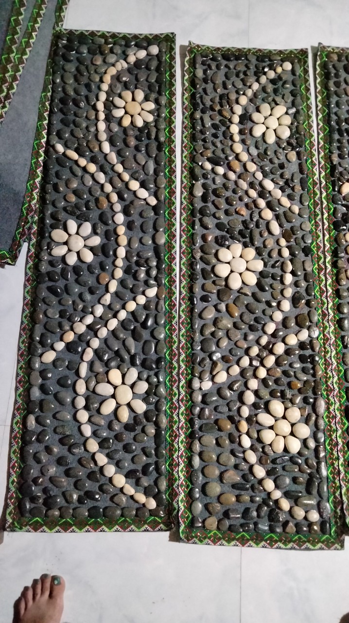 Thảm đá cuội massage chân
