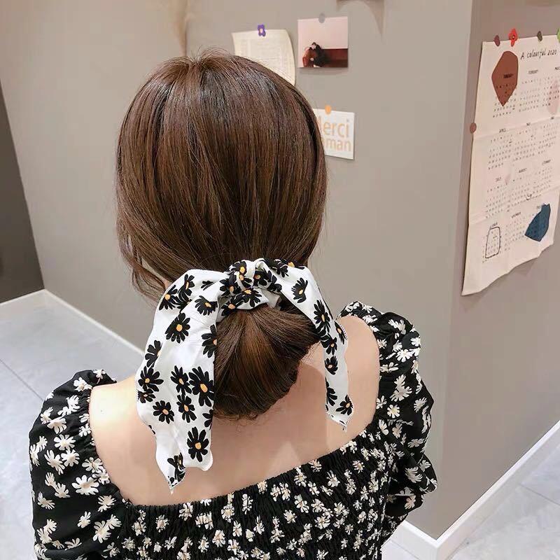 Cột tóc nơ hoa cúc dài tiểu thư sang trọng Tatitava