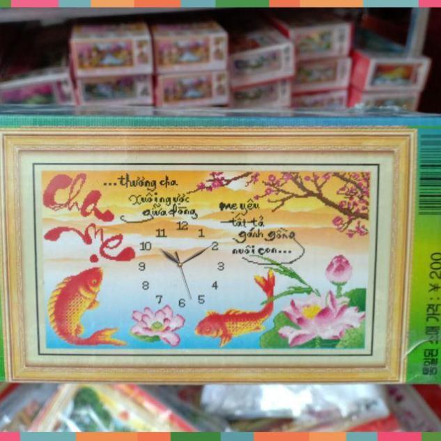 Tranh đính đá đồng hồ cha mẹ kt 75*46cm hình thật