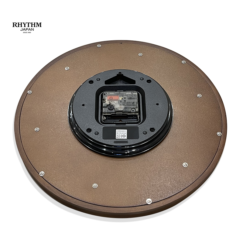 Đồng hồ treo tường Nhật Bản Rhythm CMG991NR06, dùng pin , KT 32.5 x 4.5cm, trọng lượng 980g, vỏ gỗ, màu nâu
