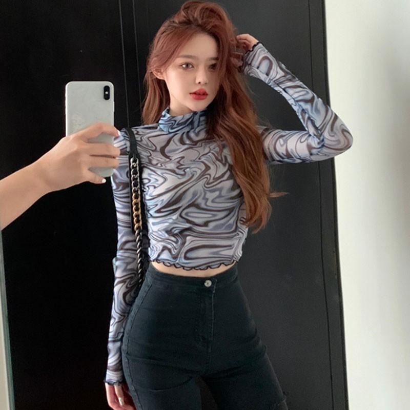 Áo thun tay dài dáng ôm in hoa văn độc đáo cho nữ