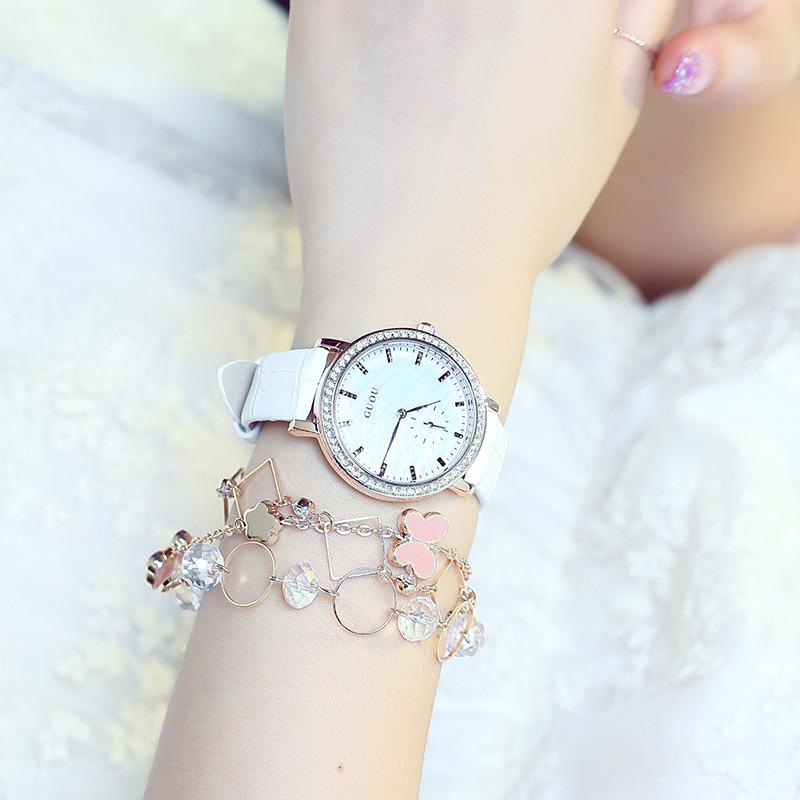Đồng hồ đeo tay nữ chính hãng Guou dây da số vạch đẹp kim rốn viền đính đá chống nướ