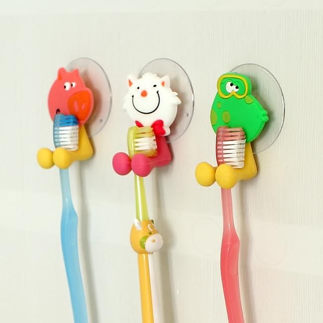 Dụng cụ kẹp bàn chải đánh răng hình thú xinh xắn hút chân không.