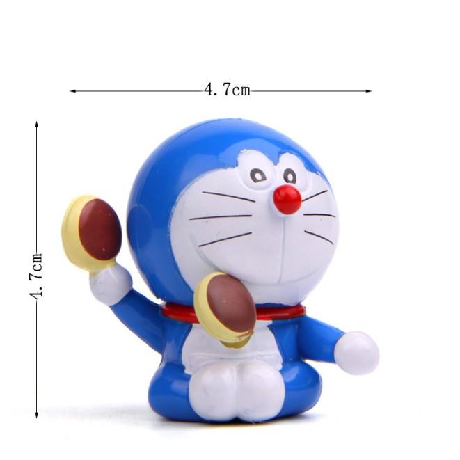 KHO-HN * Mô hình Nobita lười biếng nằm ngủ và mèo Doraemon ăn bánh rán quen thuộc