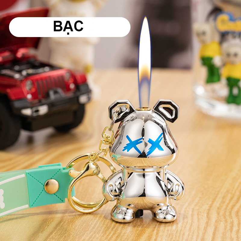 Bật lửa hột quẹt móc khóa hình gấu BEARBRICK chữ X dễ thương - xài gas
