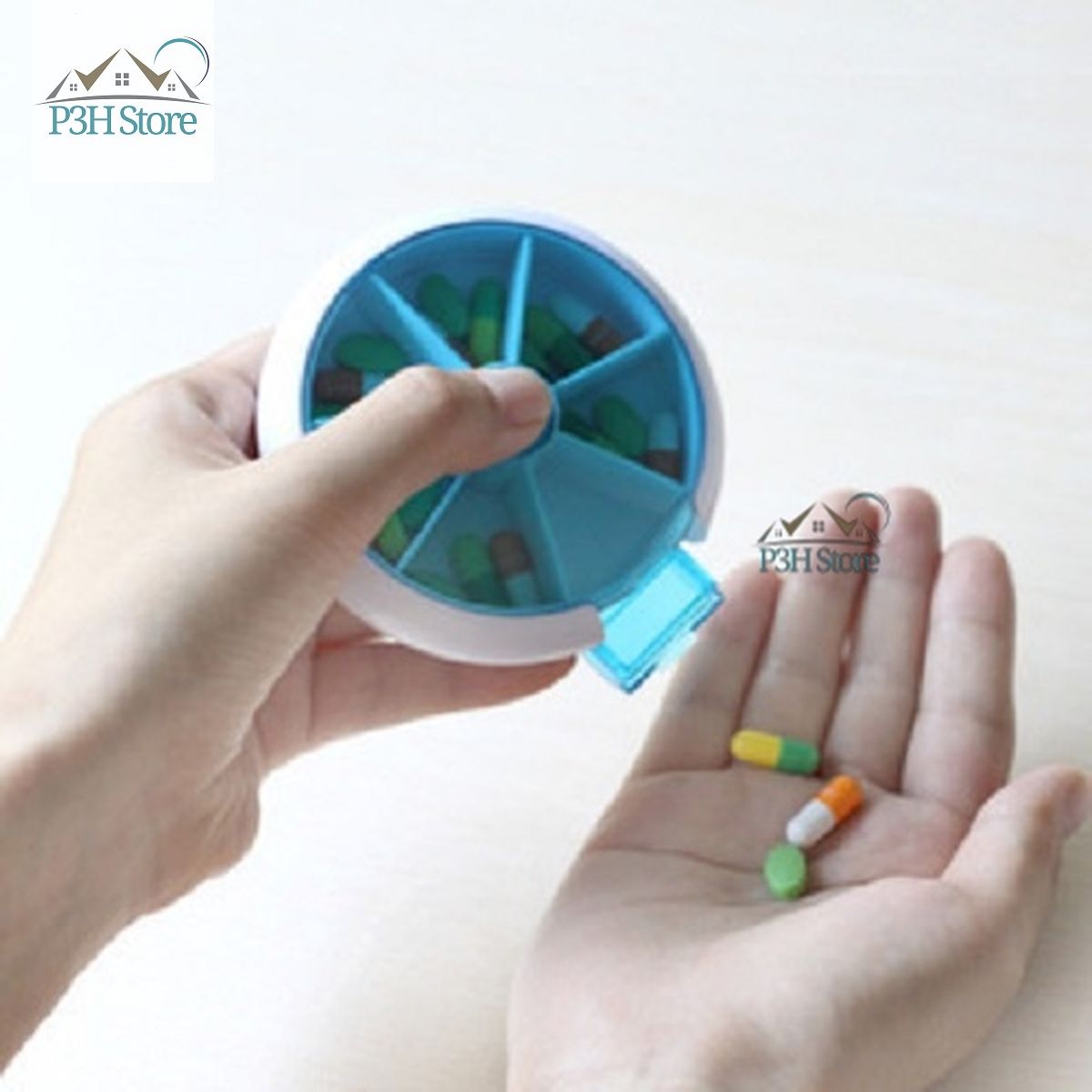 Hộp chia thuốc 7 ngăn hình tròn có nút bấm xoay lấy thuốc tiện dụng RY-167