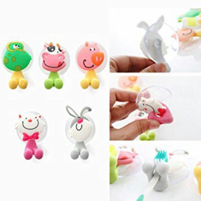 Móc treo bàn chải đa năng hình thú.