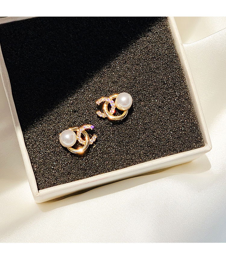 Khuyên tai sát tai đơn giản - bông tai chữ x đính ngọc tiểu thư