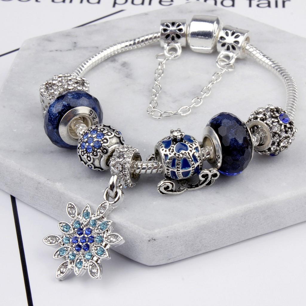 Vòng tay charm hoa tuyết xanh