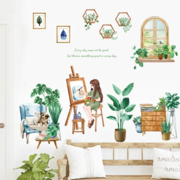 Decal trang trí tường - Cô gái ngồi vẽ tranh cùng những chậu cây xanh