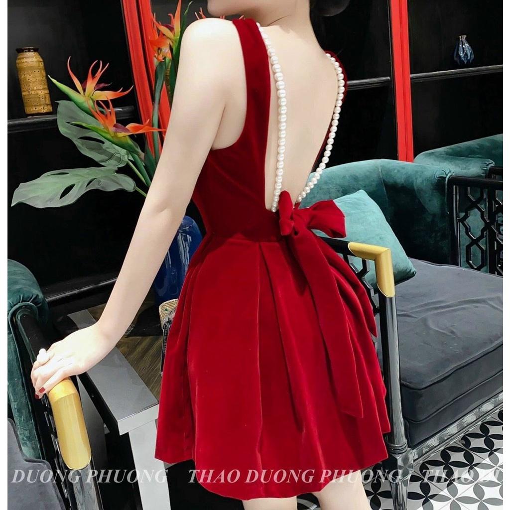 Đầm xoè nhung 2s đính cườm nơ lưng