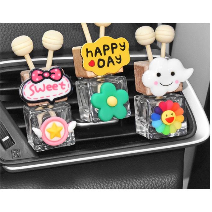 Lọ đựng tinh dầu khuếch tán nước hoa ô tô cài cửa gió gắn hoa sắc màu - Hoàng Đông Shop