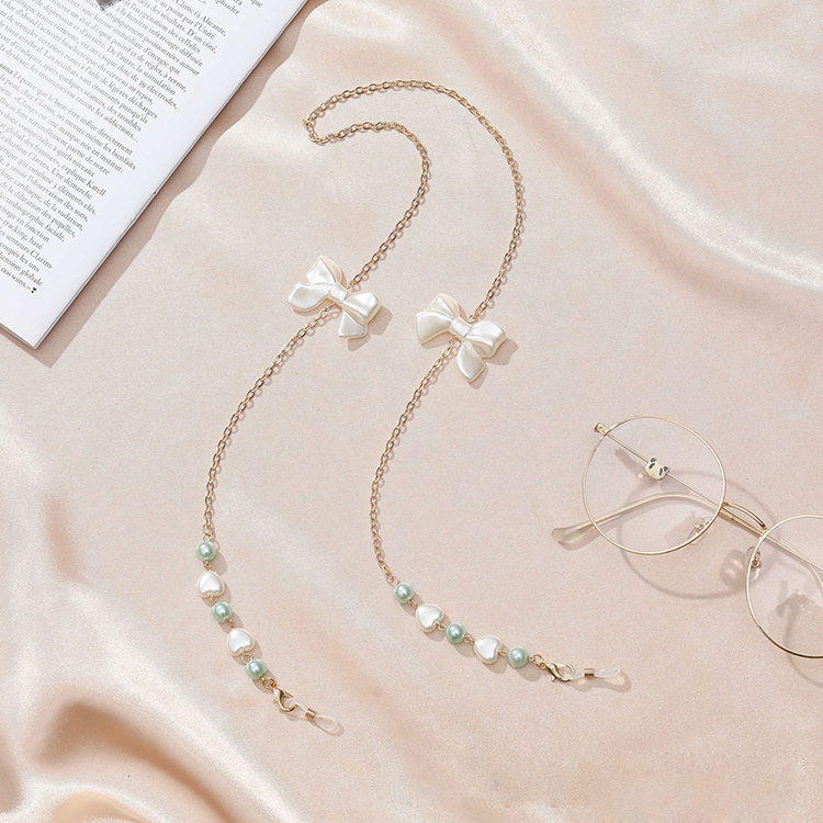 Dây kính chuỗi dây chuyền đeo gọng kiếng đeo khẩu trang mix nơ và trái tim phong cách thời trang nổi bật hot girl