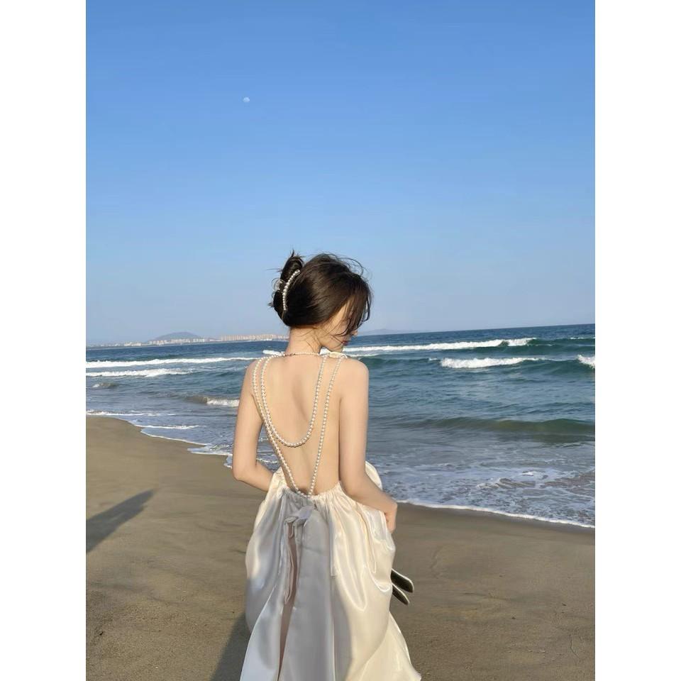 Đầm dáng suông họa tiết nơ sau lưng size S wabisabi