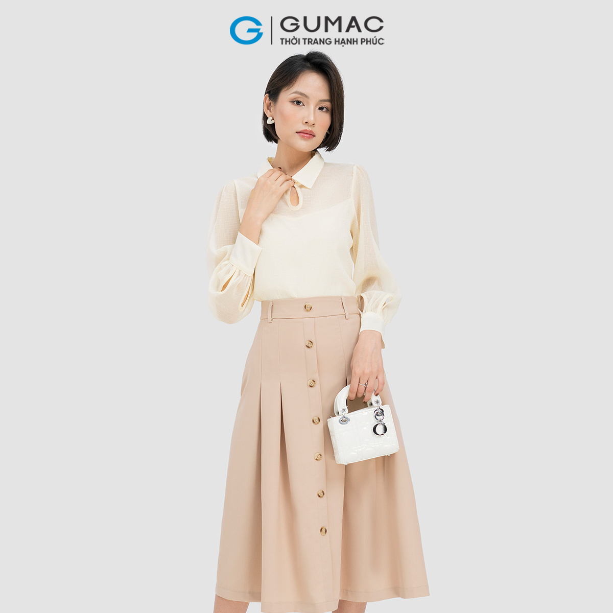Chân váy A nẹp nút Gumac VD04005