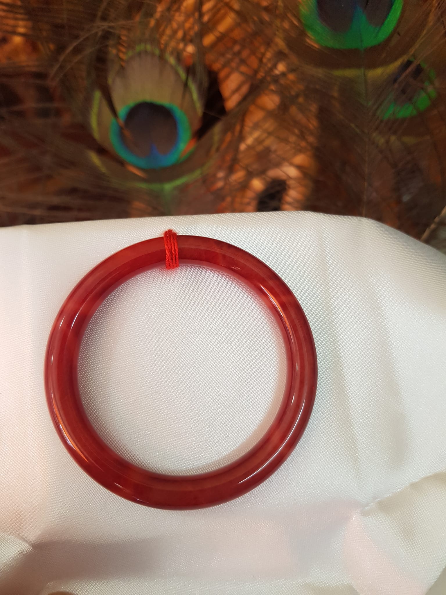 Vòng Nữ đá cẩm thạch Đỏ Đẹp 50mm x cọng 7,2mn Màu đỏ đậm vân vân đậm nhạt đều đẹp Nữ mệnh Hỏa Thổ 49kg - 54kg ạ