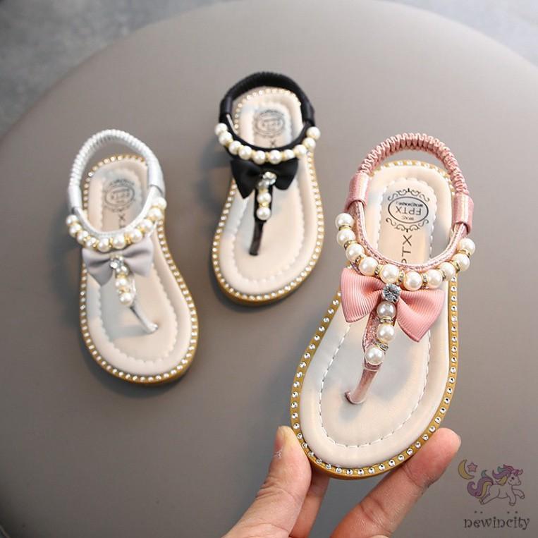 Giày sandal xỏ ngón đính ngọc trai phối nơ phong cách Hàn Quốc cho bé gái