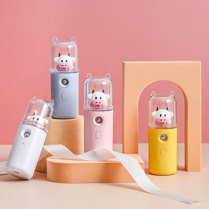 MÁY PHUN SƯƠNG , TẠO ĐỘ ẨM XÔNG HƠI MẶT NANO MINI CẦM TAY HÌNH CHÚ BÒ SỮA ĐÁNG YÊU