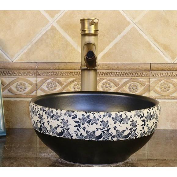 Chậu sứ lavabo nghệ thuật để bàn với tông màu đen huyền bí