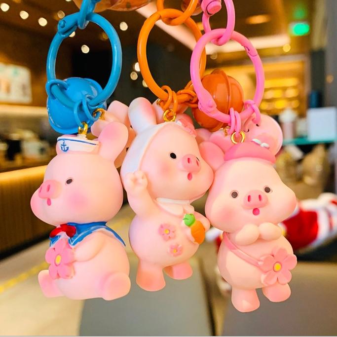 Móc khóa heo con biêu cảm có chuông kêu dễ thương xỉu PVC loại tốt