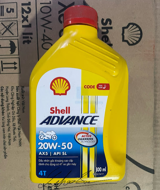 Shell ax5 20w-50. 800ml . Shell vàng cho xe chở nặng (chuyên shipper giao hàng)