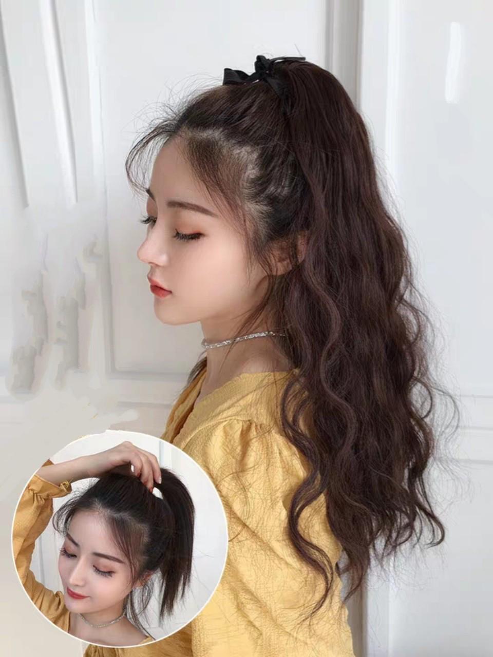 Tóc giả cột xù mì siêu xinh. Giống y tóc thật và đẹp hơn tóc thật. Chất tóc tơ loại 1 có thể dùng nhiệt để bấm uốn , duỗi gội thoải mái
