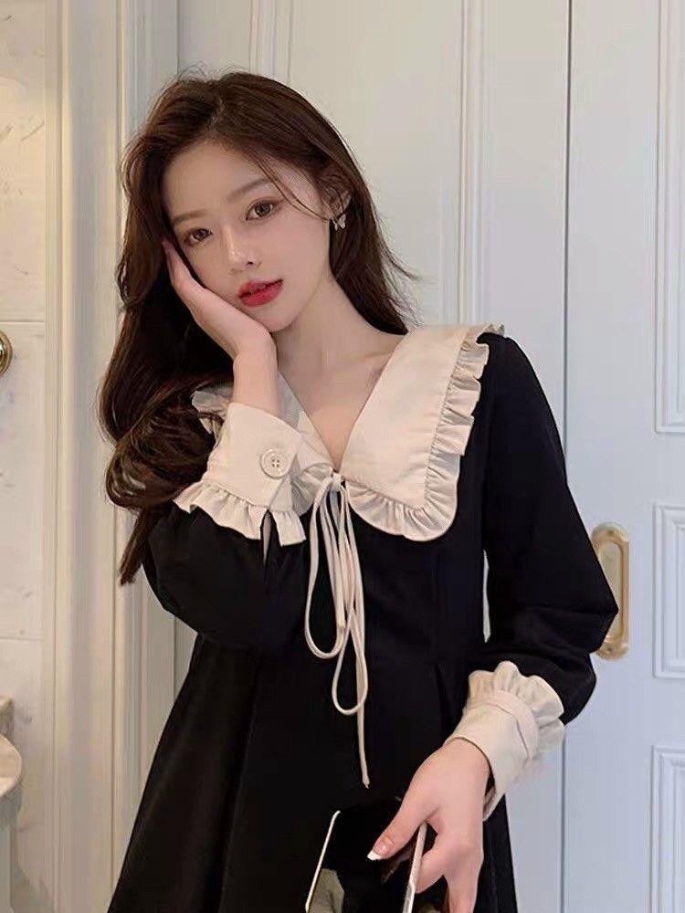 Đầm cổ bèo tay dài đính nơ