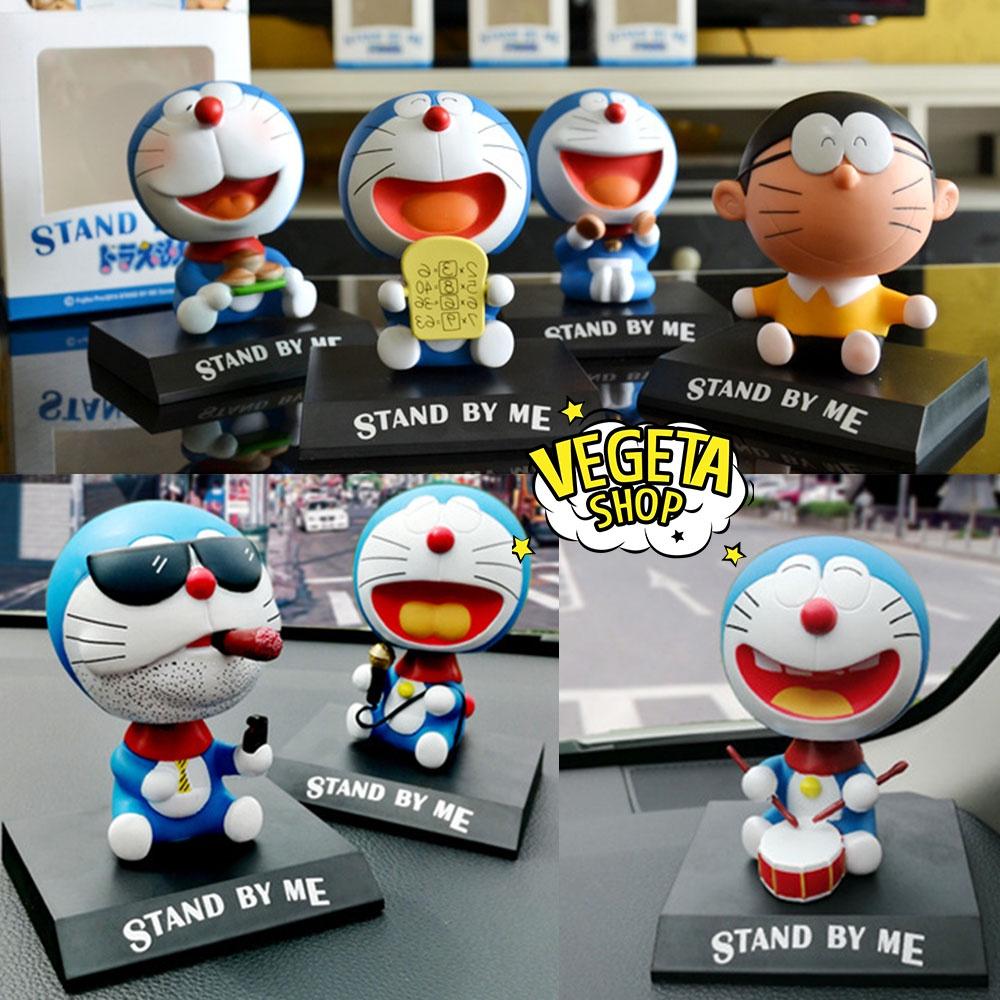 Mô hình mèo ú Doraemon Doremon gật gù trang trí - Giá đỡ điện thoại bàn làm việc bàn học tủ sách taplo ô tô quà tặng