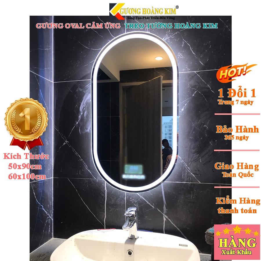 gương cảm ứng đèn led treo tường oval elip bầu dục nhà tắm phòng wc trang điểm makeup decor phôi gương bỉ AGC cao cấp kích thước 50x90cm và 60x100cm guonghoangkim mã HK-2006