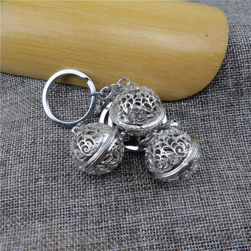 Móc khóa cung linh bạc