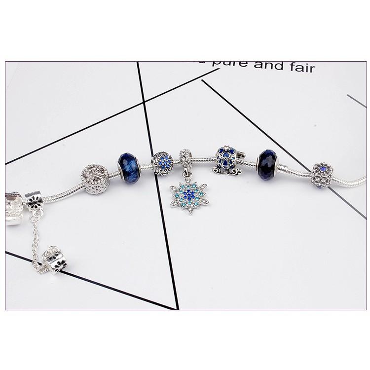 Vòng tay charm hoa tuyết xanh