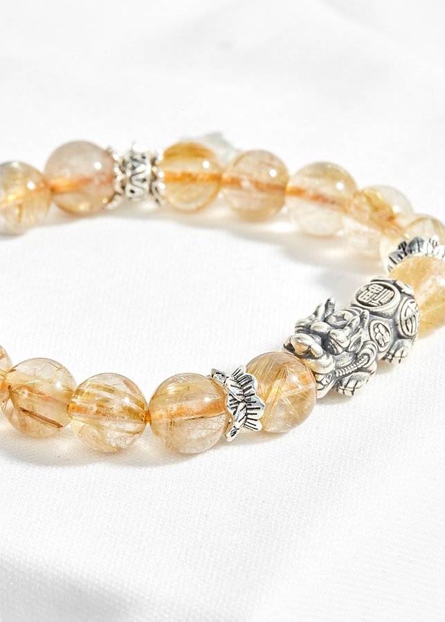 Vòng thạch anh tóc vàng phối chim én xuân Ngọc Quý Gemstones