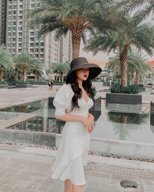 ĐẦM TRẮNG CỔ V VIỀN REN ĐUÔI CÁ