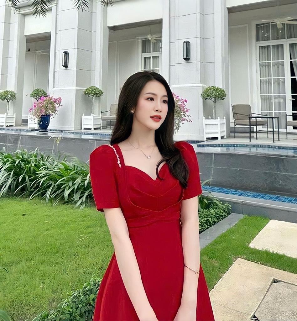 Đầm xòe tay phồng viền đá chéo eo