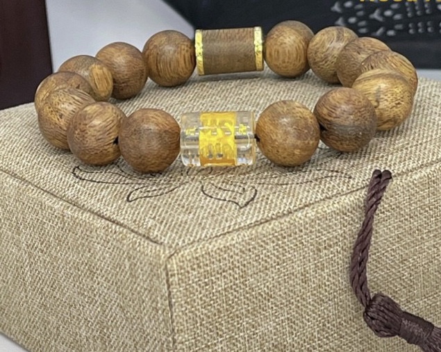 Vòng Tay Trầm Hương Mix Charm Hạt Tròn