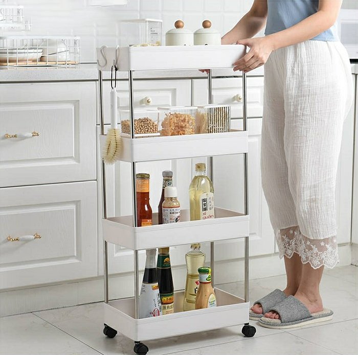 Kệ để đồ dùng đa năng làm từ nhựa PP 4 tầng có bánh xe, có lỗ thoát nước, có 4 móc treo đồ tiện dụng mới 2021 + tặng một tạp dề hoa cúc - Màu ngẫu nhiên