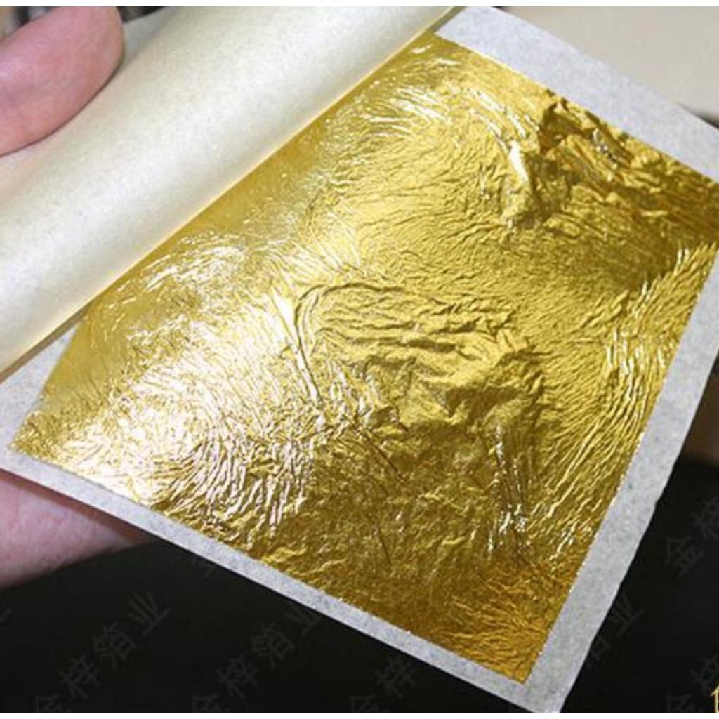 100 lá vàng khổ 9cm dùng ngoài trời dát vàng ngoại thất kèm theo keo , phủ bảo vệ lá vàng