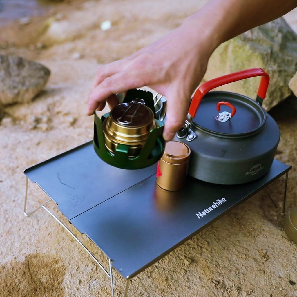 Bếp cồn dã ngoại du lịch mini Naturehike bằng hợp kim nhôm nhỏ gọn dễ sử dụng phù hợp cho các chuyến picnic, leo núi.