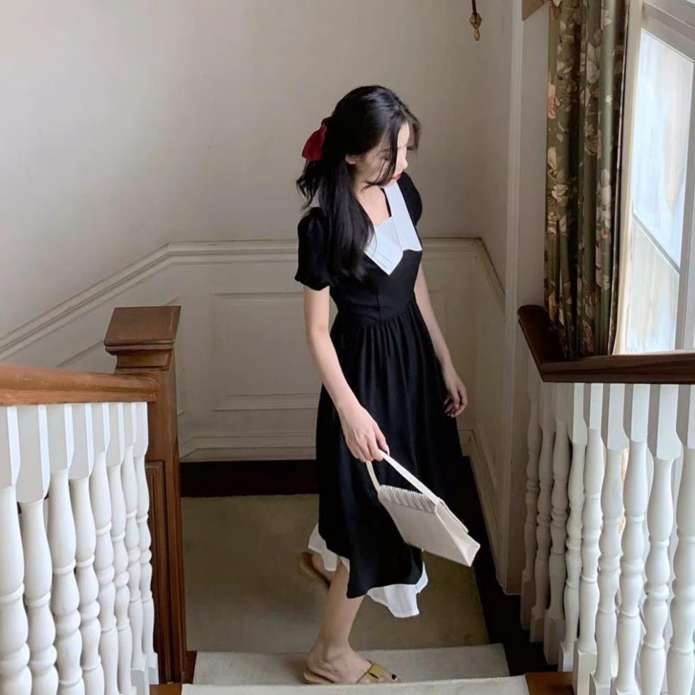 Đầm đen cổ trắng 3 lớp đuôi cá trắng tay bo ngắn chân bèo voan trắng