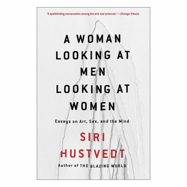 A Woman Looking At Men Looking At Women
