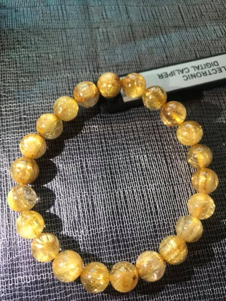 VÒNG THẠCH ANH TÓC VÀNG ĐỒNG TRỤC VIP 8LY5 NỮ MỆNH KIM THỔ THỦY