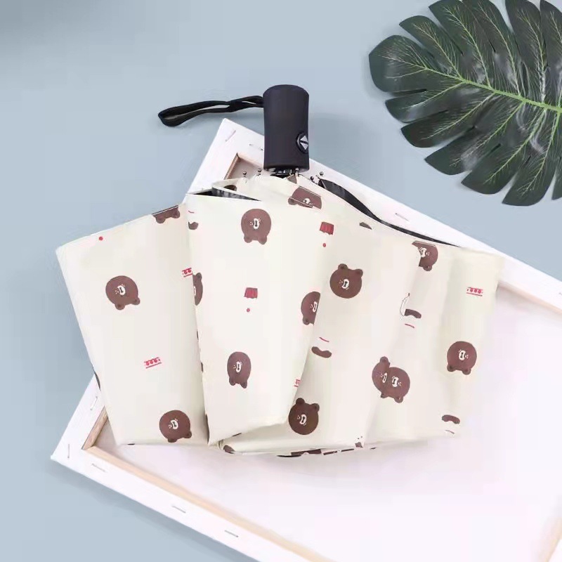 Ô dù   che nắng , đi mưa , họa tiết hình  gấu xinh xắn   dễ thương  ,  gấp gọn  , chống tia UV , có túi đựng tiện lợi ,  dễ dàng mang theo mọi nơi 